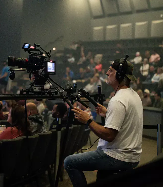 Camera operator at service